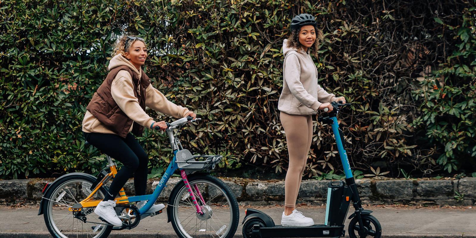 Two women riding together on specially designed vehicles for the Beryl Women's Tour 2023