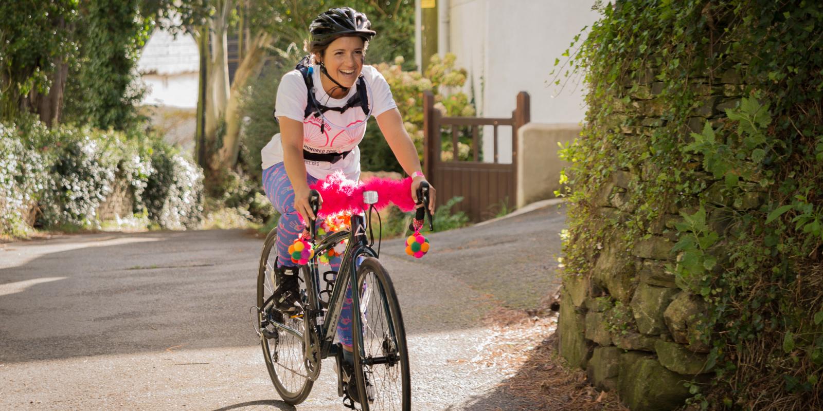 Woman cycling for Hilly Hundred