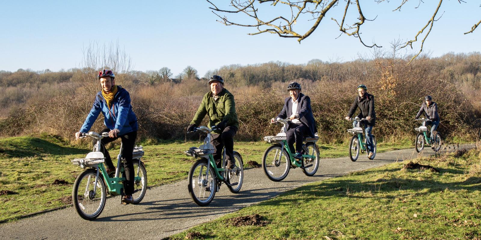 Mayors riding Beryl bikes with scheme lead Ash Trowe