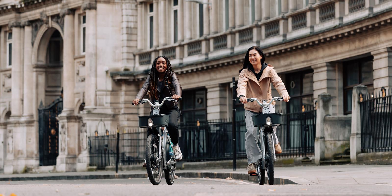 Two riders using Beryl's new BBE2 e-bike in central London 