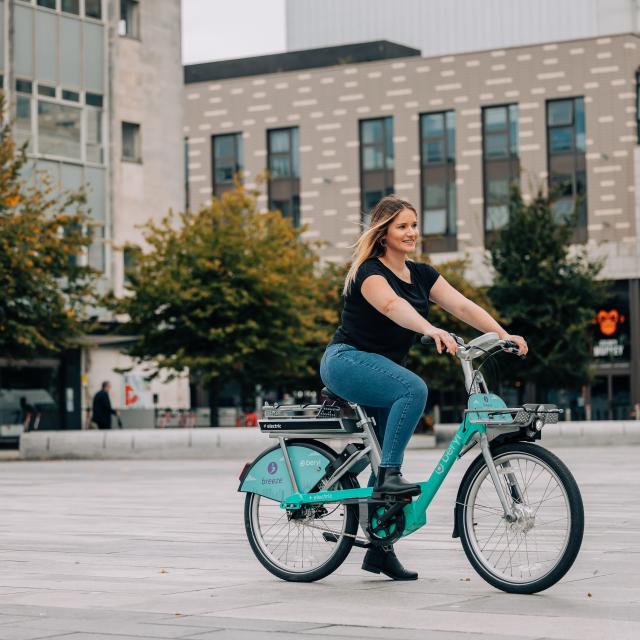 Woman riding Beryl bike in Southampton
