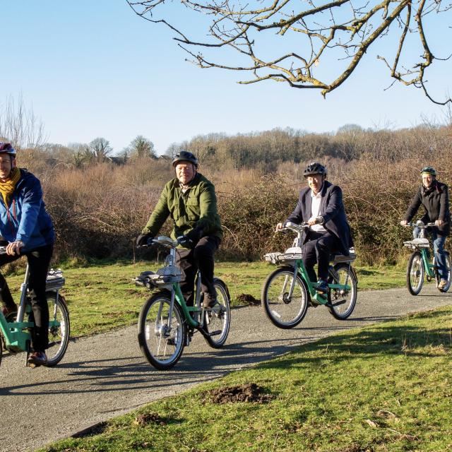 Mayors riding Beryl bikes with scheme lead Ash Trowe