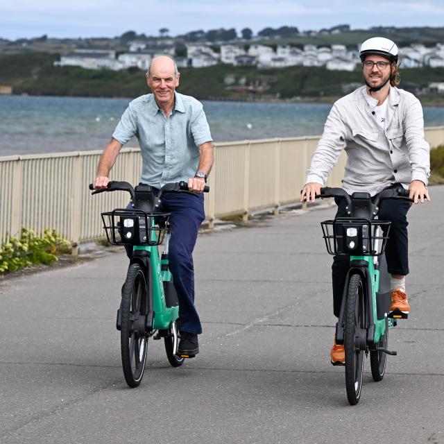 Beryl and Dorset Council representatives cycle along Weymouth front 