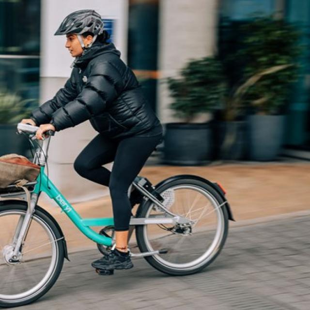 Beryl bike rider wearing a helmet