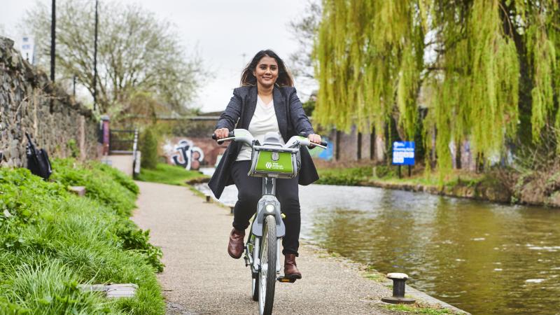 Woman riding West Midlands Cycle Hire bike