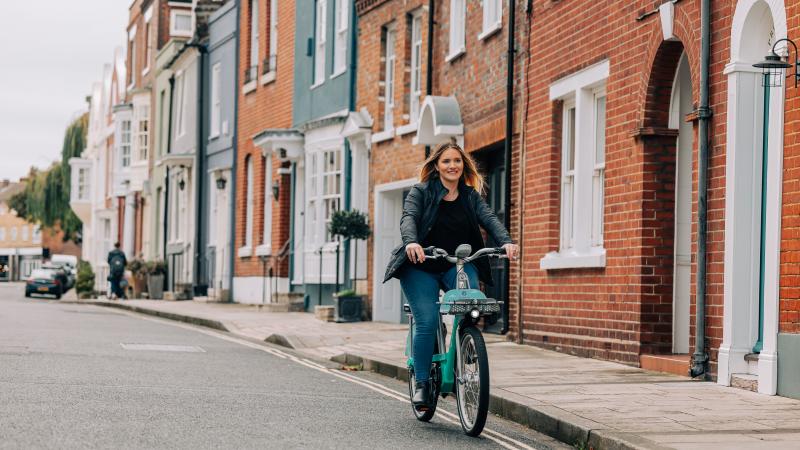 woman riding Beryl bike in Portsmouth