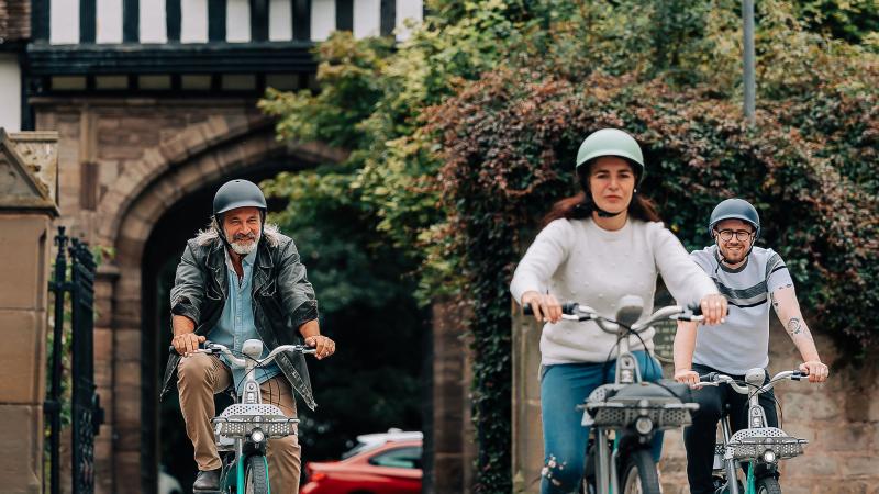 3 cyclists in hereford on the road with helmets on