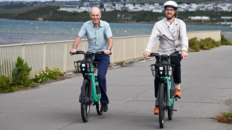 Beryl and Dorset Council representatives cycle along Weymouth front 