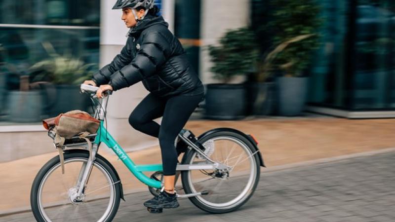 Beryl bike rider wearing a helmet