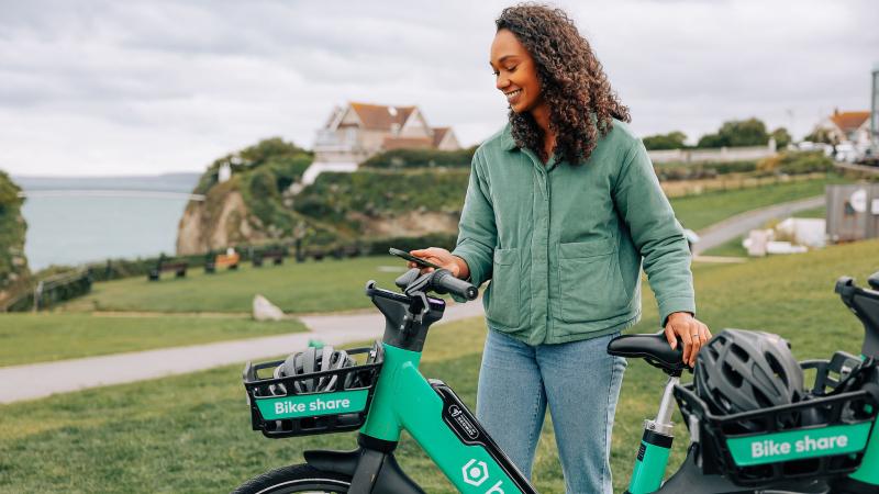 Beryl e-bike rider in Cornwall stood with e-bike